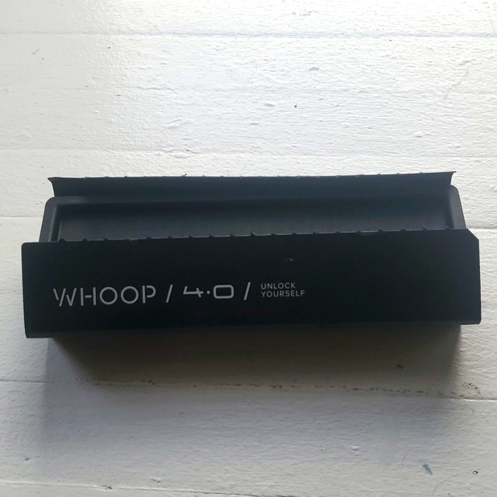 Whoop Wristband and Charging Cube